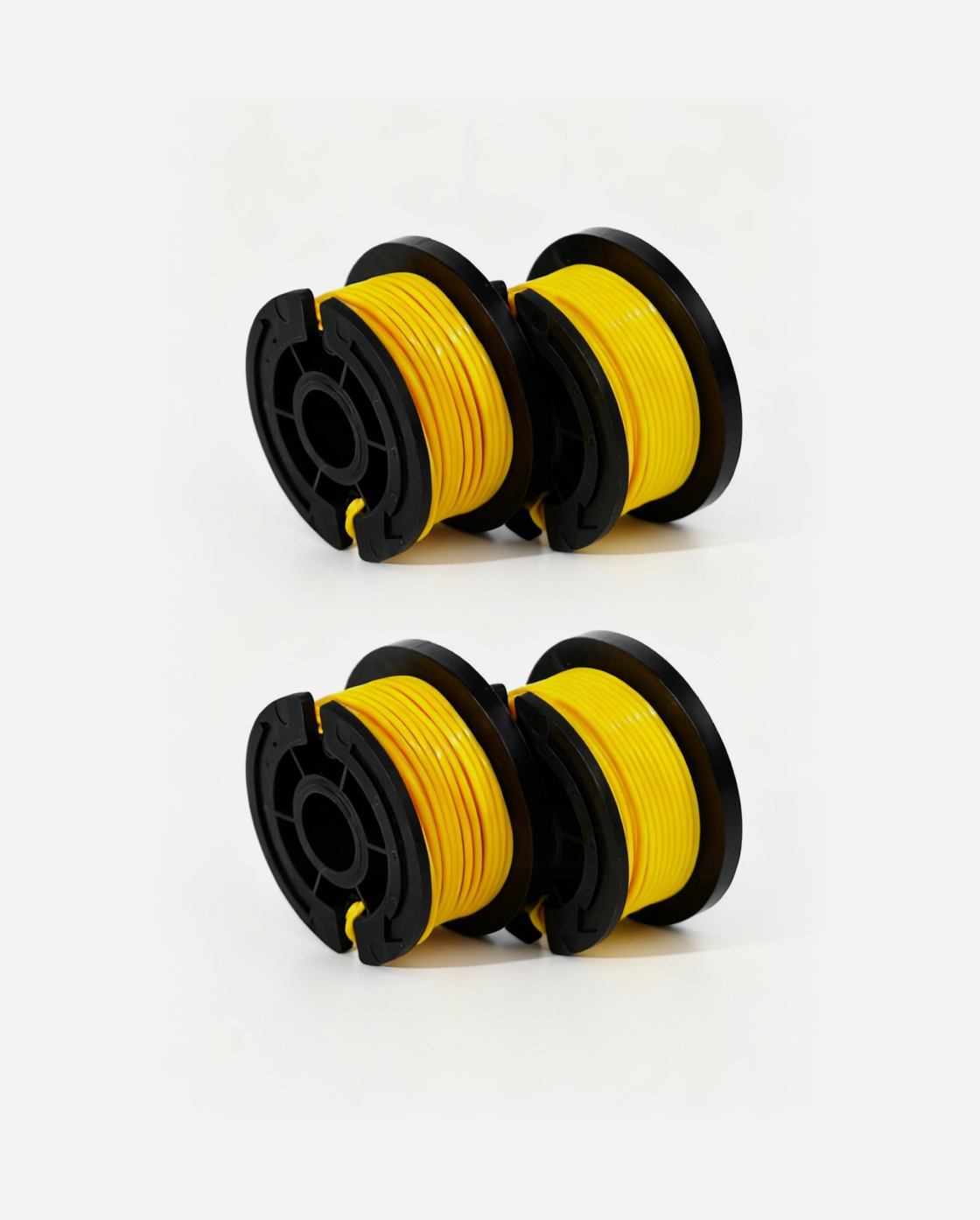 Yellow trimmer line spool with black plastic housing, two units shown side by side on white background