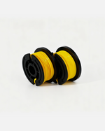 Yellow trimmer line spool with black plastic housing, side view, two units on white background