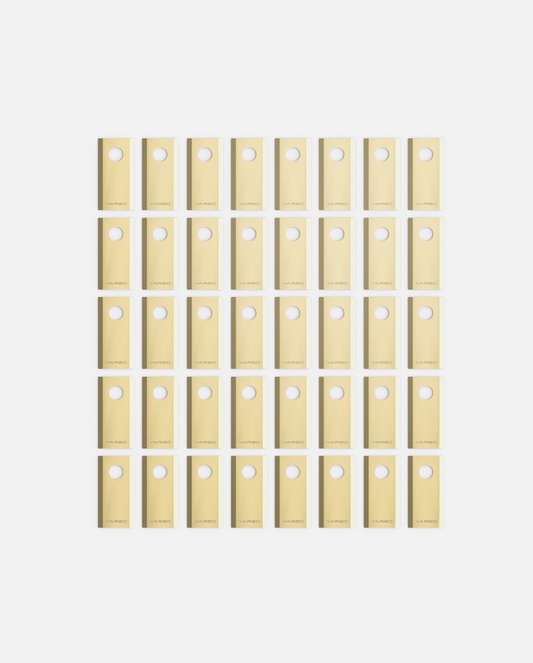 40-piece set of beige YARBO cutting blades with circular holes, arranged in grid pattern, front view