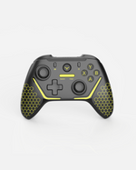 Black and yellow remote controller with hexagonal grip patterns and dual analog sticks, front view