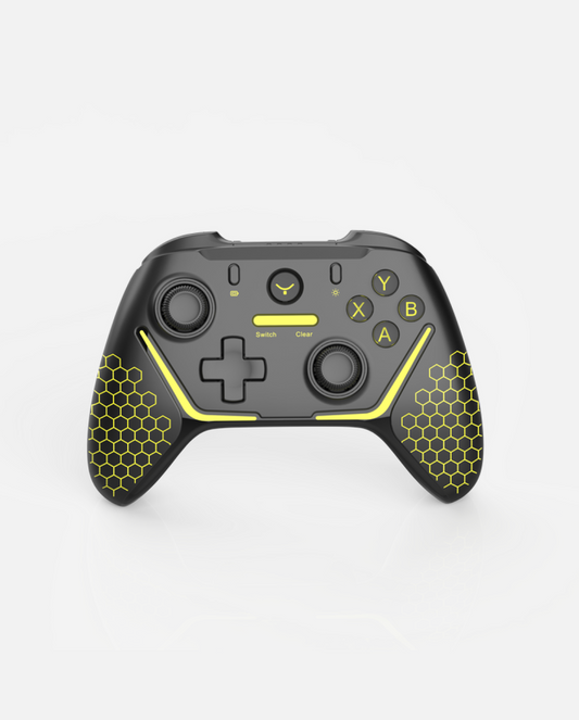 Black and yellow remote controller with hexagonal grip patterns and dual analog sticks, front view