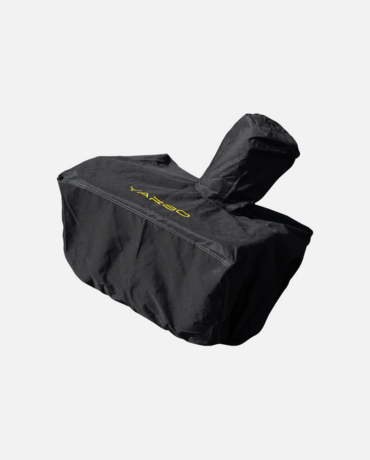 Black snow blower module cover with yellow YAKSO logo, textured fabric, side view, protective design